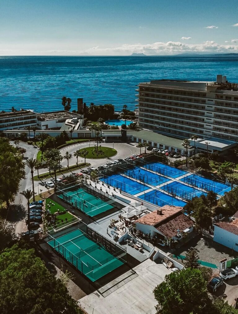 CAP Racket Club Marbella aerial view of padel courts by the sea