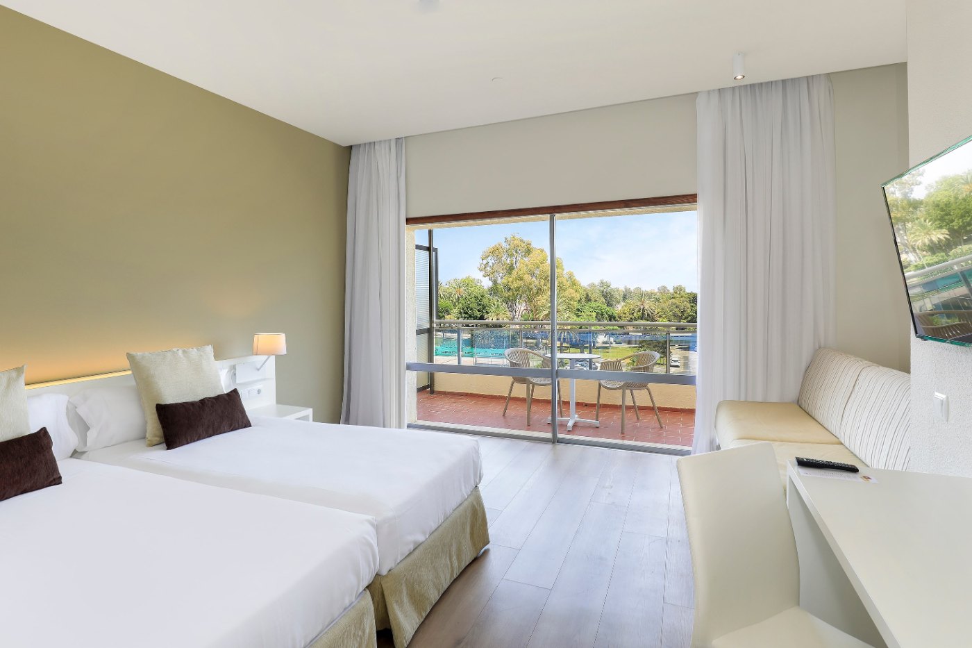 Twin room with balcony overlooking the pool